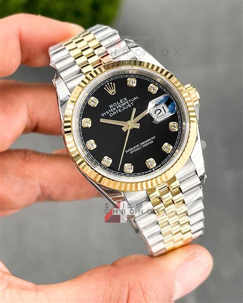 2 tone rolex with a diamond dial